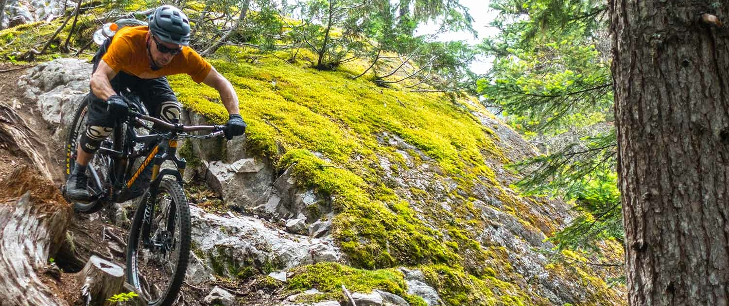 The author finding that biking can also be Type 2 fun on a steep chute near Squamish, BC.