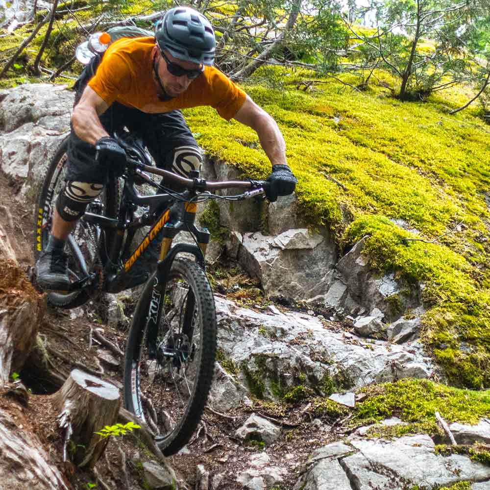The author finding that biking can also be Type 2 fun on a steep chute near Squamish, BC.