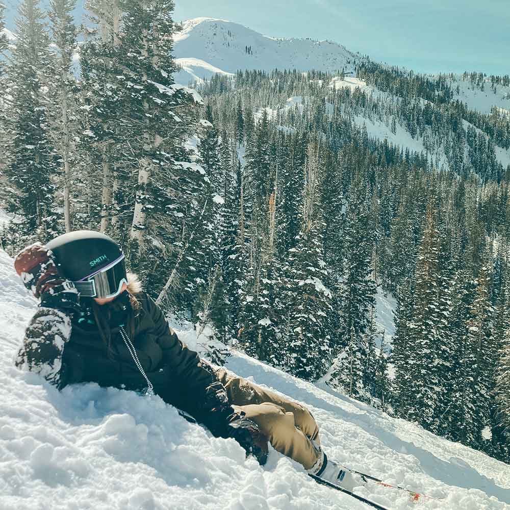 Sometimes you've just got to stop and smell the pine trees. Author Ayja Bounous’ close friend Sarah Brunson taking a breather at Snowbird Ski Resort, Utah in January 2021.