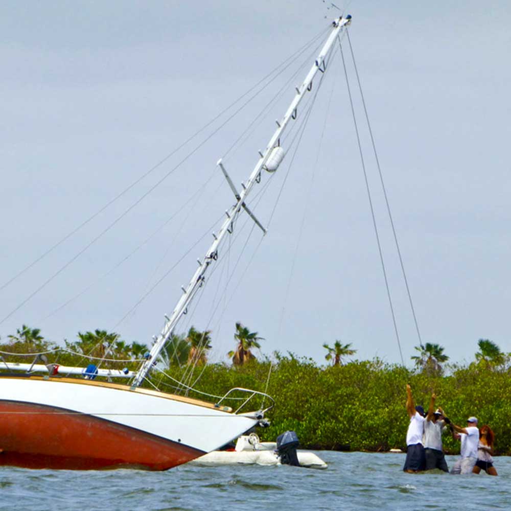 Tipping The Rascal with halyards from the top of the mast after Hurricane Odile.